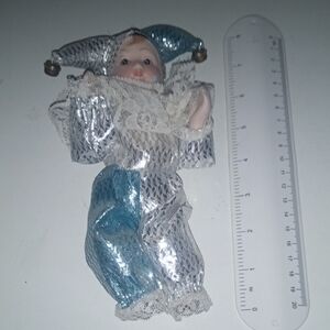 Blue and Silver Porcelain Doll